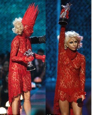 Lady in red lace: GaGa wore the dress with matching mask, which she removed 